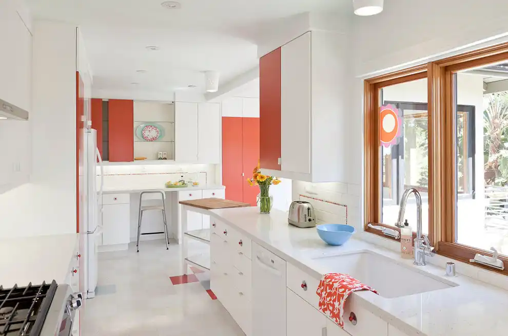 Coral and white kitchen design
