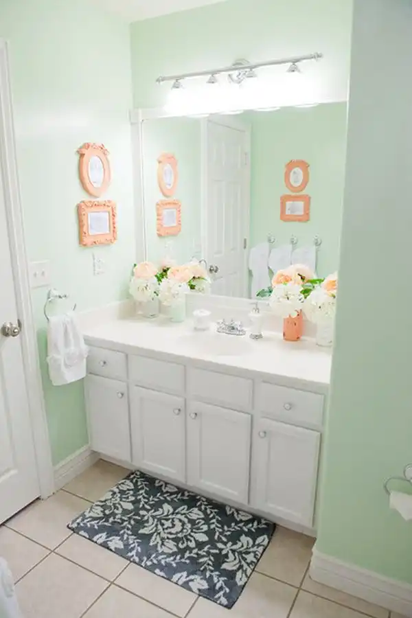 Coral framed art and mint walls