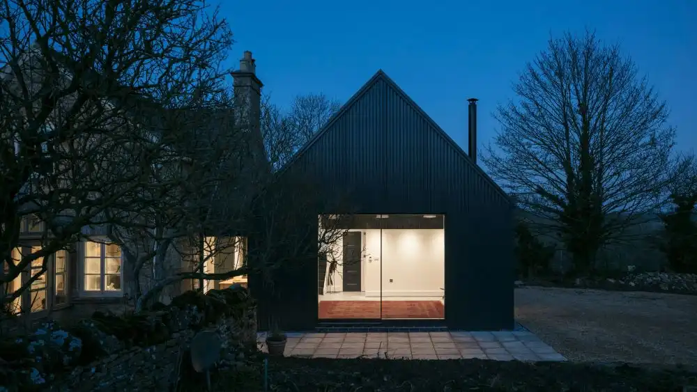 Corrugated metal extension eastabrook architects front view