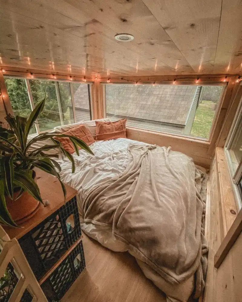 The loft area is divided into two sections at opposite sides of the house, one of them being the bedroom