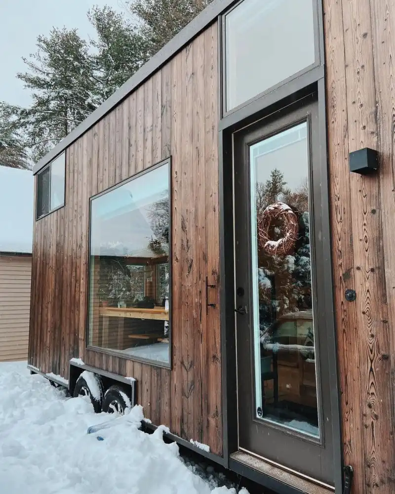 This tiny house is a lovely blend of stylish, cozy, cheerful and fresh details topped with a modern aesthetic
