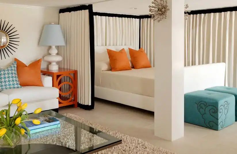Curtains make division for bedroom