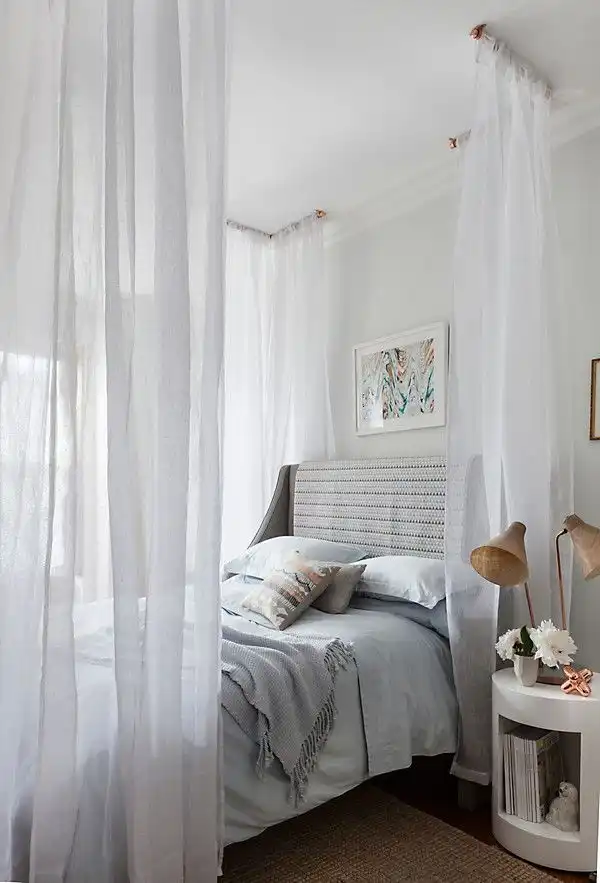 Curtains wrap around bed