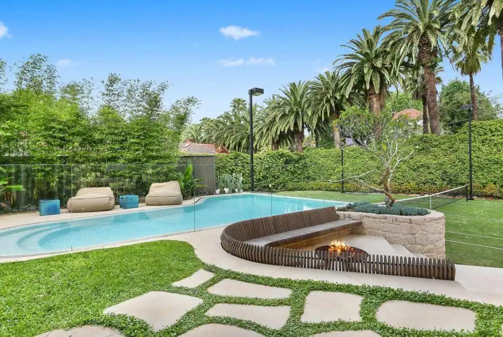 Curvilinear features and beautiful outdoor with fire pit