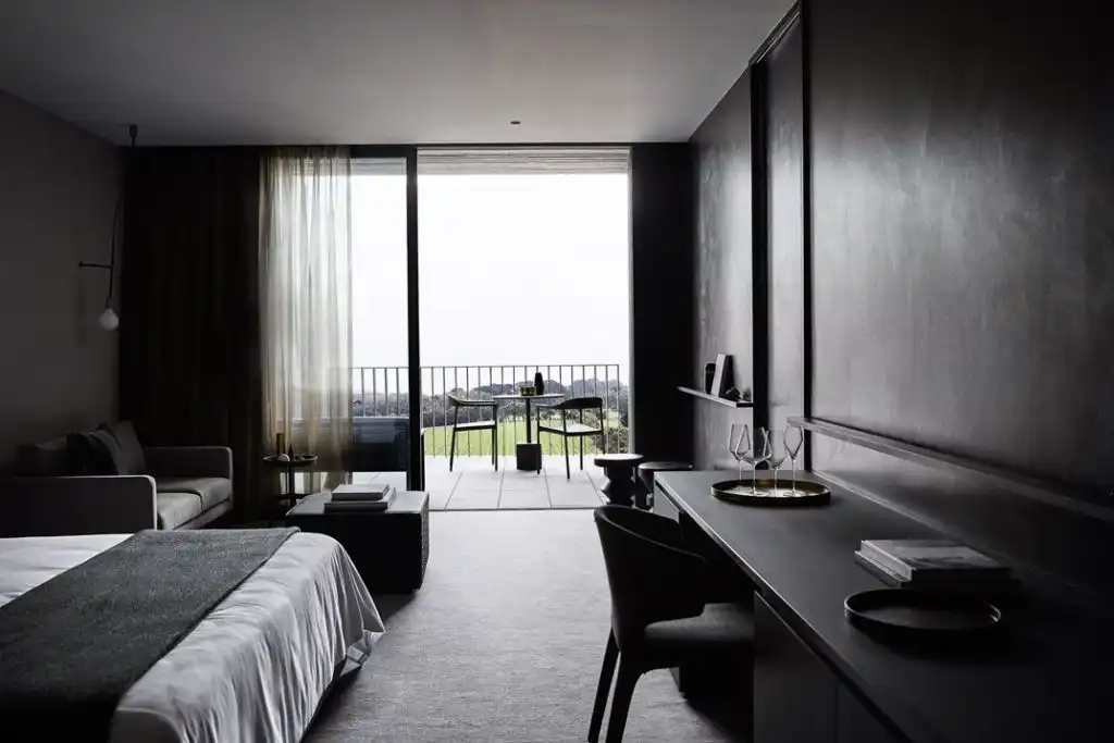 The dark space is offset by the plentiful natural light.