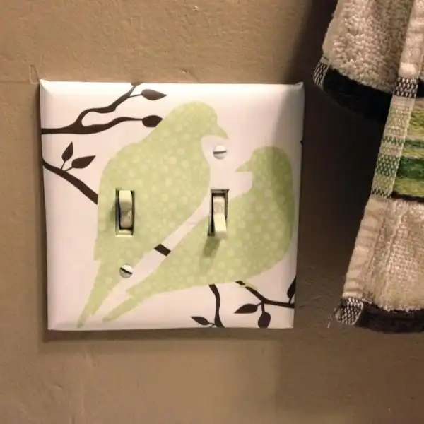 Decorative paper for light switch cover