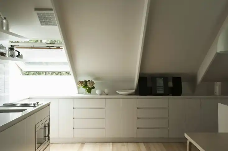 Garage studio apartment by Karin Montgomery Spath kitchen attic
