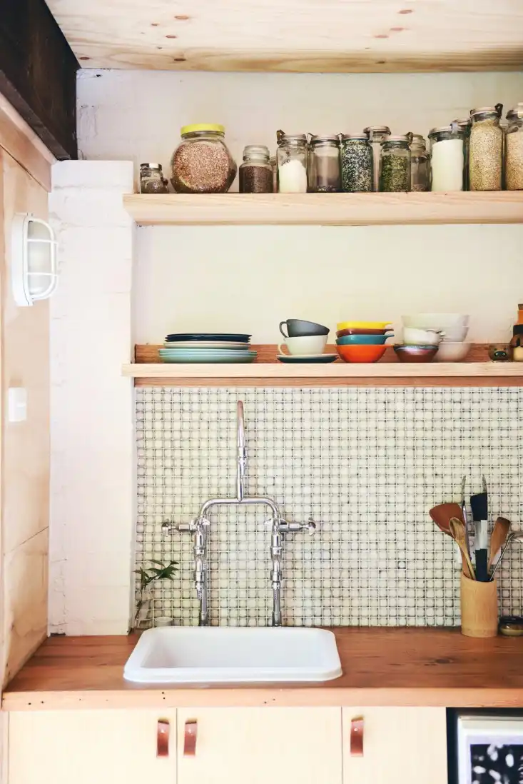 Garage turned studio apartment backsplash