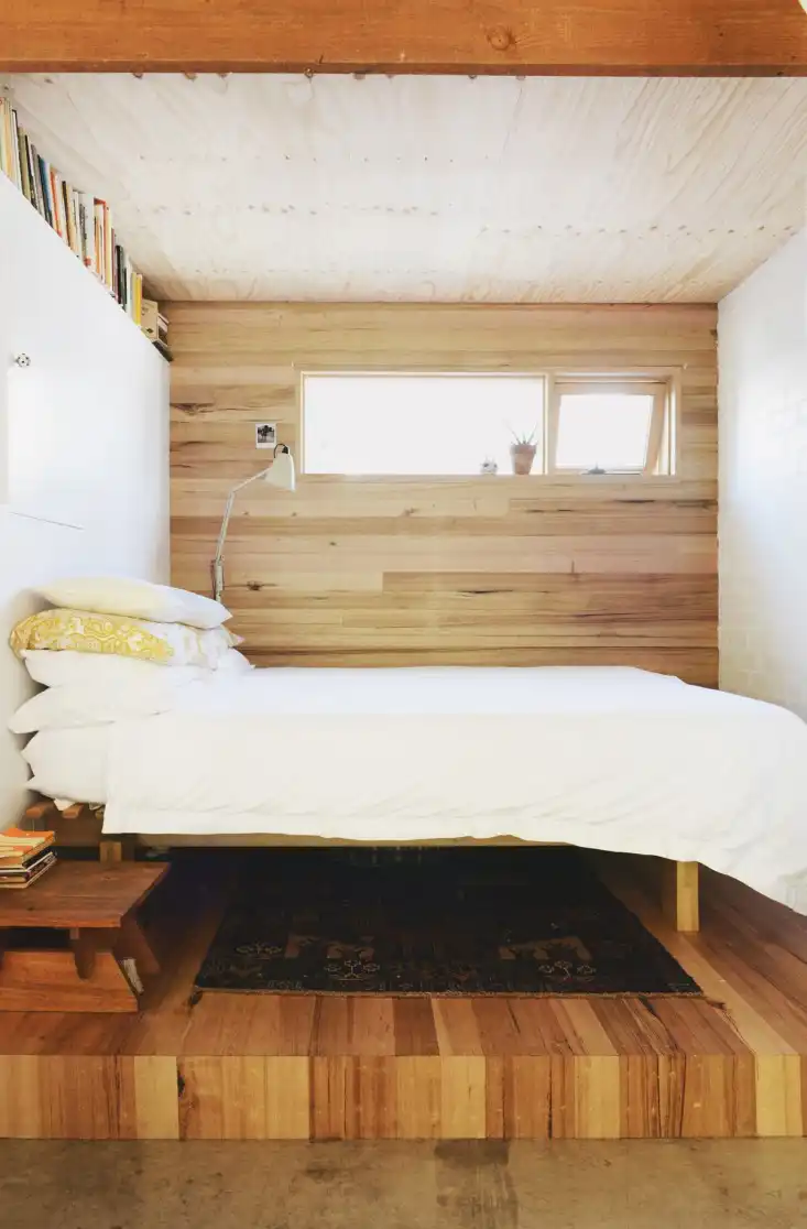 Garage turned studio apartment bedroom
