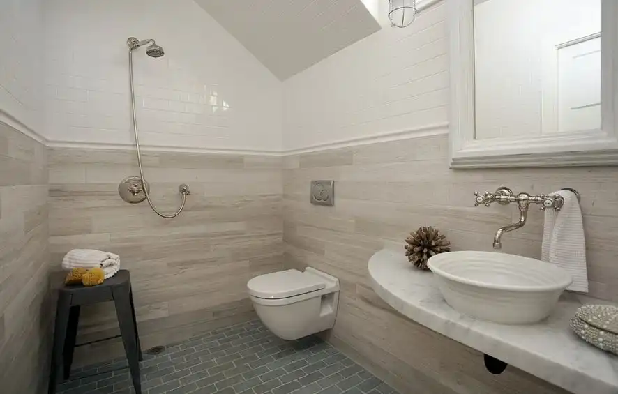 Grey marble bathroom with wall hung toilet