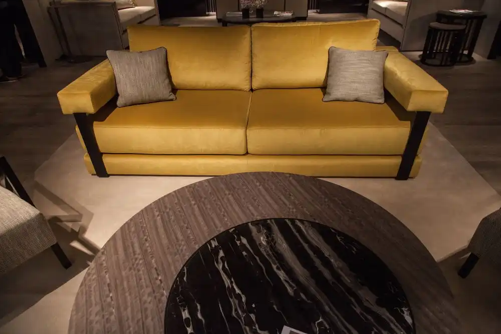Hawthorne yellow sofa with a wood frame