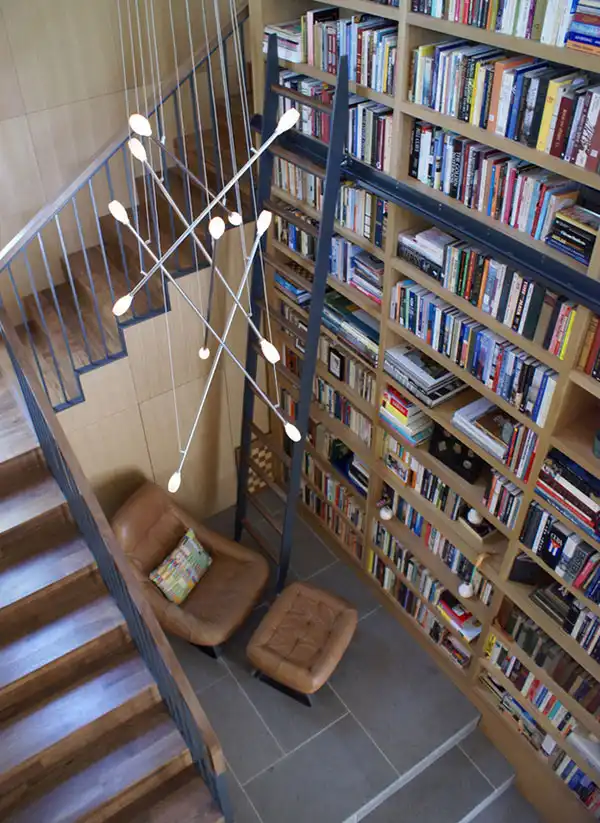 High ceilings batons chandelier home library