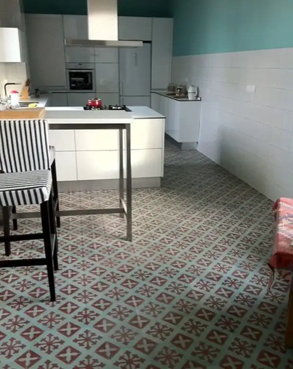 Kitchen featuring a colorful floor