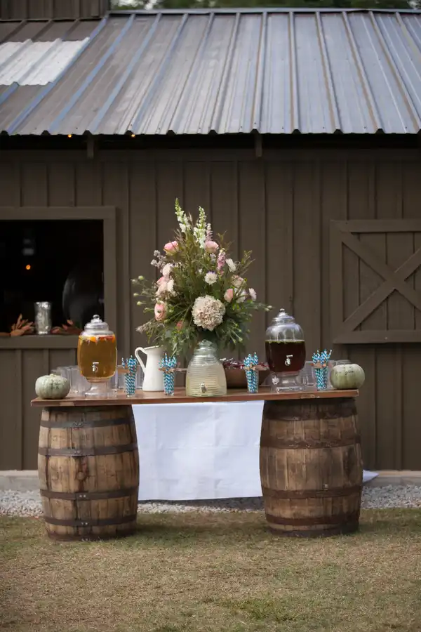 A rustic candy bar on wooden barrels