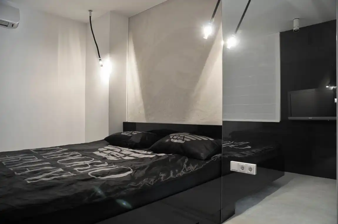 Make the Bed the Only Black Feature in the Room