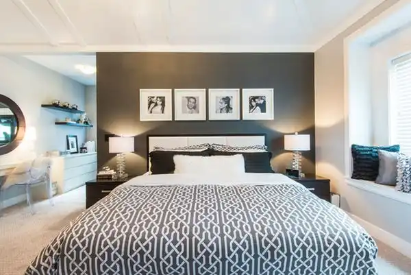 Modern bedroom white walls black headboard
