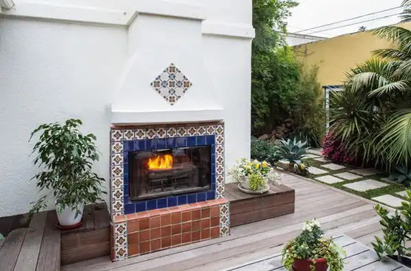 Moroccan tiles around fireplace