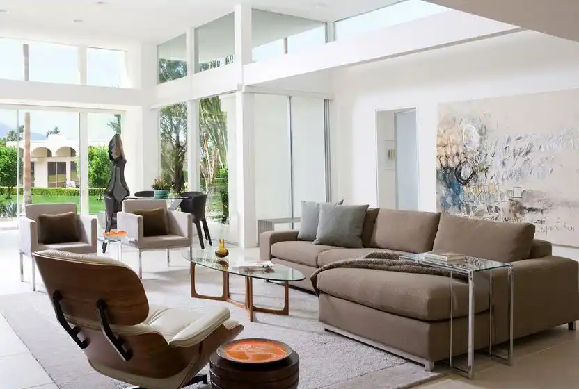 Natural light living room eames lounge chair and c tray table