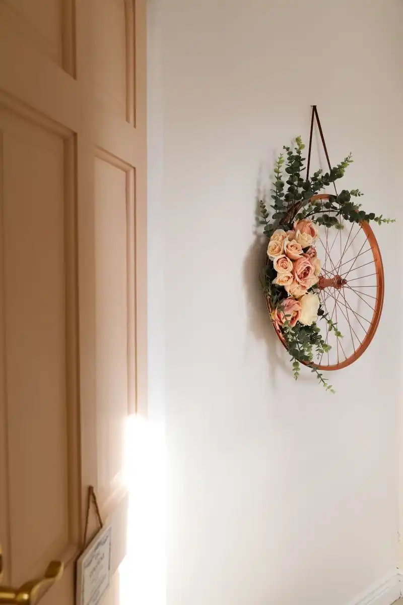 Old bike wheel hanging wall
