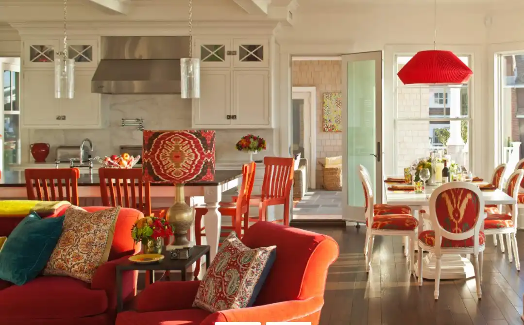 Open space family room with orange accents