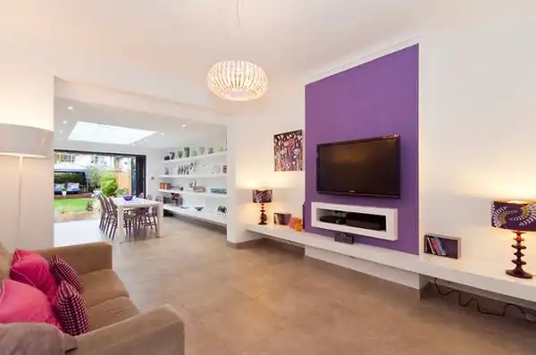 Paint bold the wall behind tv