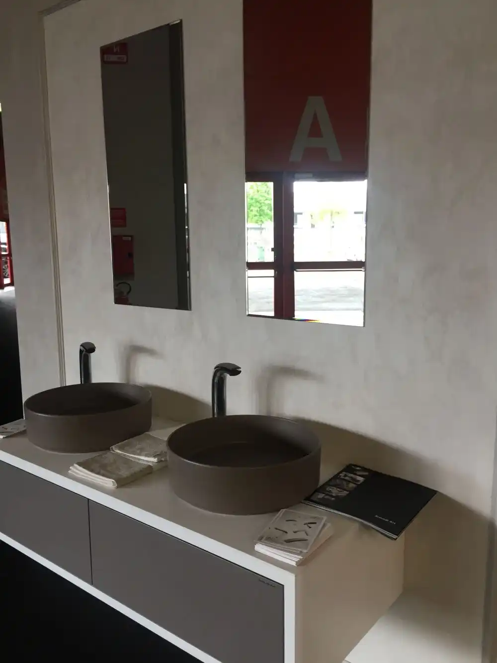Let a round-edge vessel sink soften the straight lines of your bathroom countertop