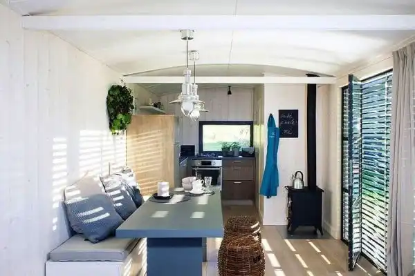 Rustic black house on wheels3