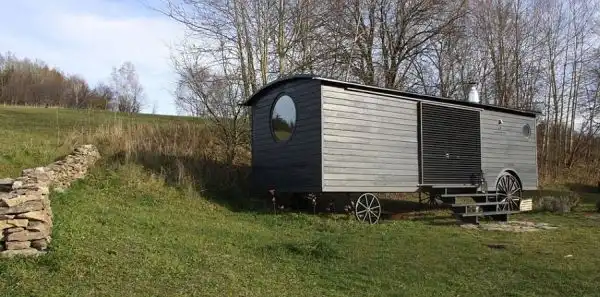 Rustic black house on wheels5
