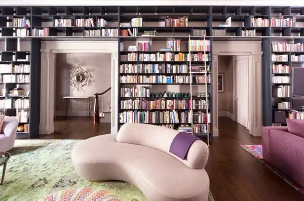Space above door bookshelf decor