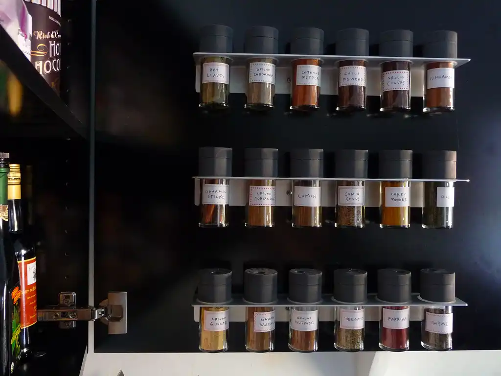 Spices behind cabinet door