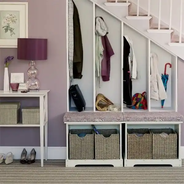 Storage ideas under stairs in hallway