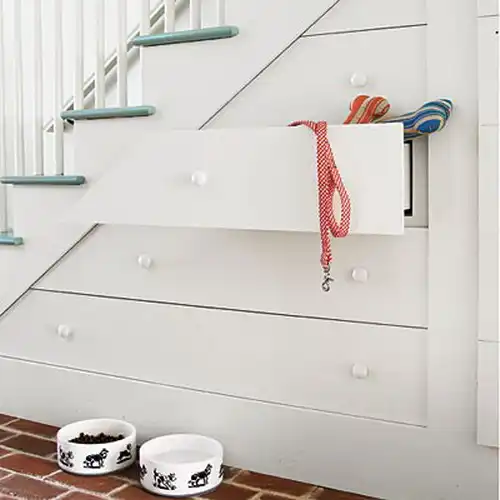 Storage ideas under stairs in hallway8