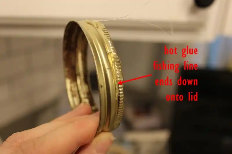 thin line of hot glue down the sides