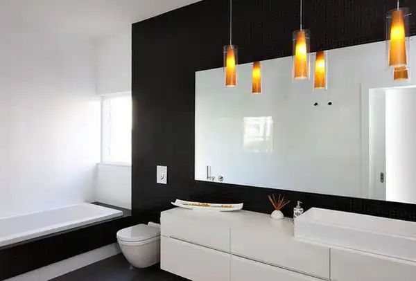Tiny black tiles white furniture for bathroom