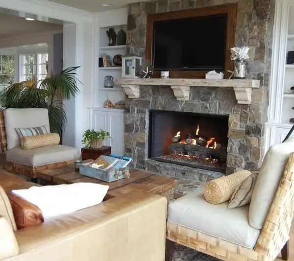 Tv above fireplace