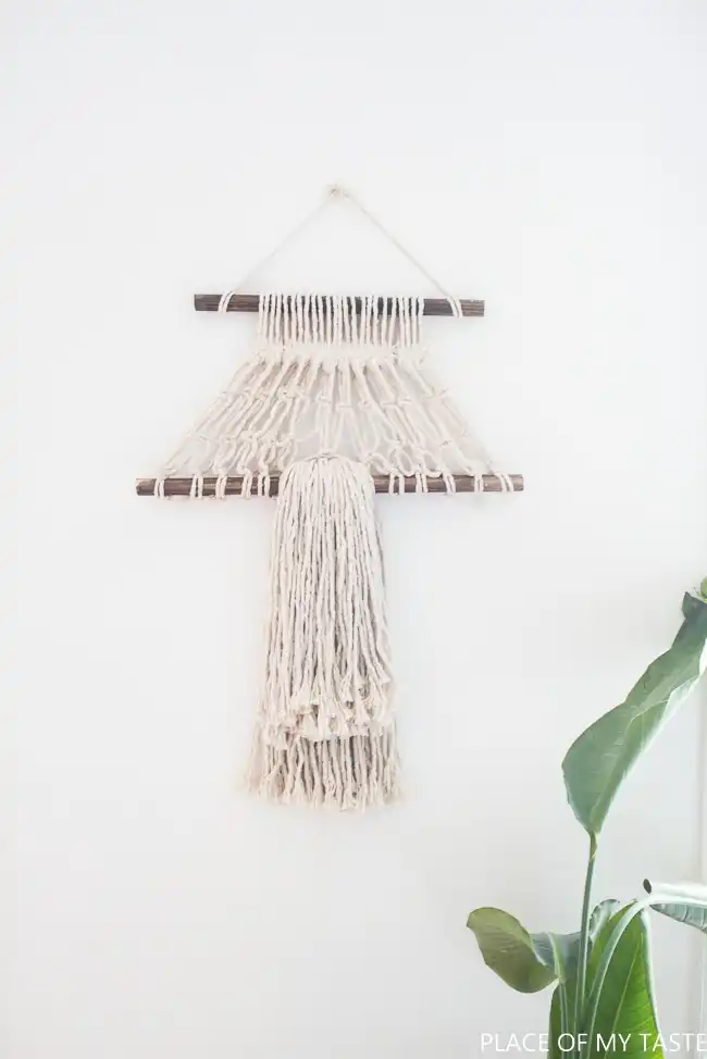 wall hanging made from cotton and wooden dowels