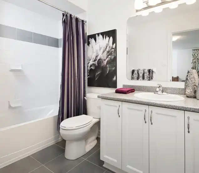 White bathroom with vertical stripes