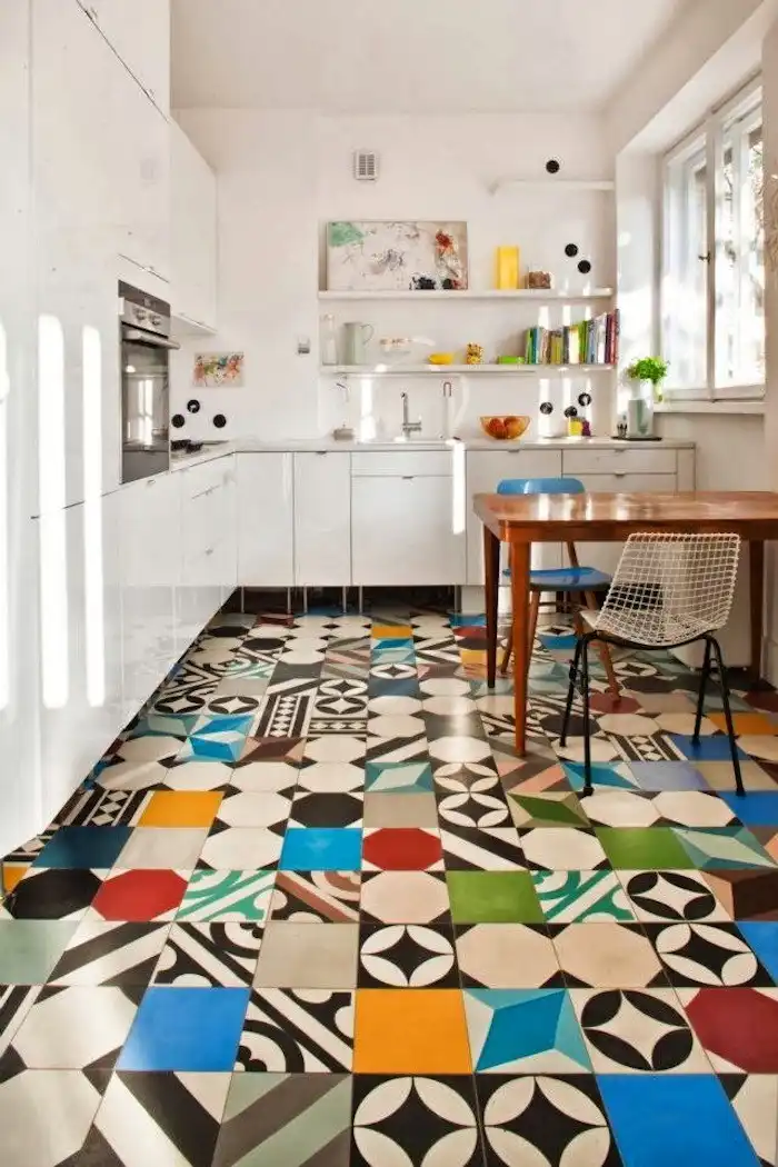 White kitchen featuring a colorful floor