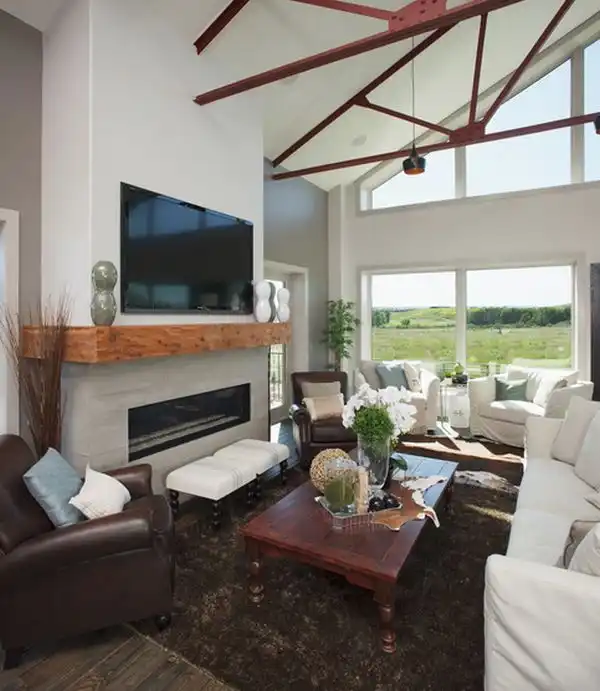 Wood mantel and tv above fireplace