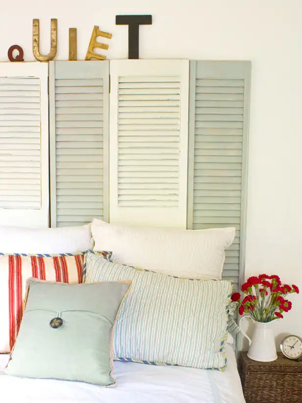 Wooden shutters used like headboard