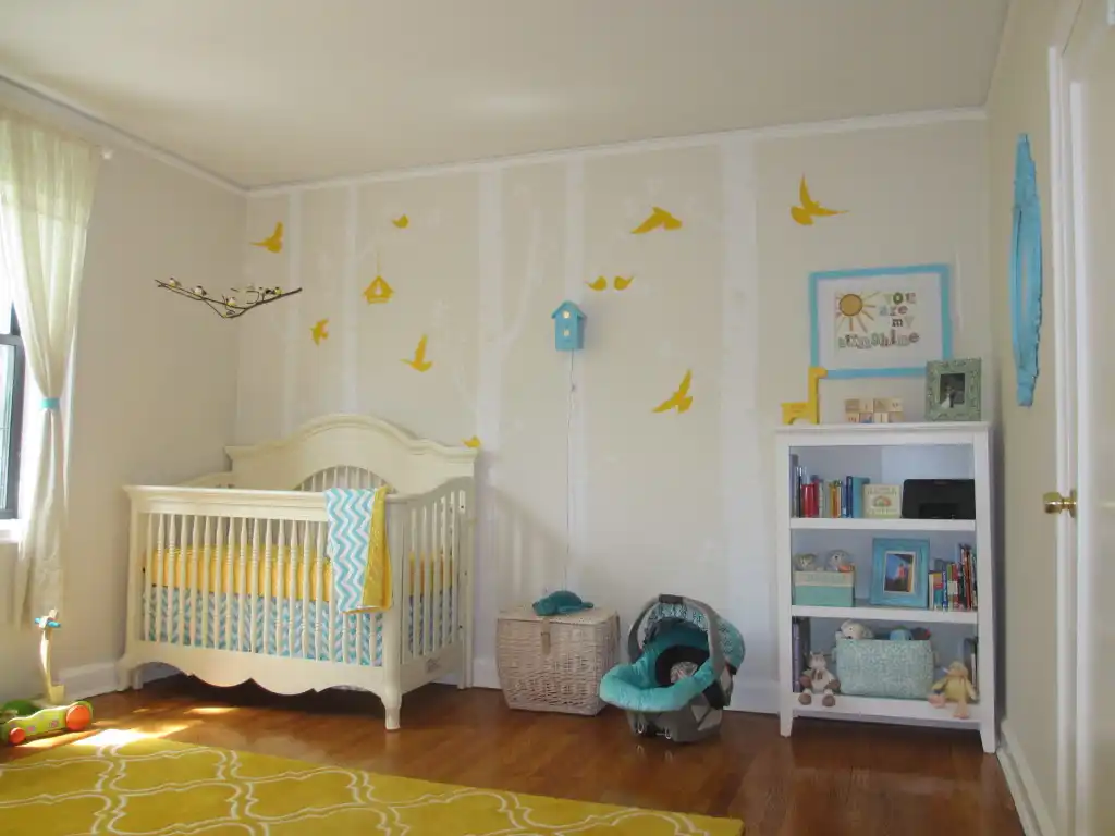 Yellow nursery room birds wall