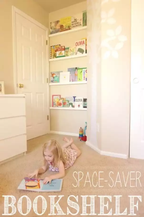 A Space Saver Bookshelf Which is Hidden Behind a Wall