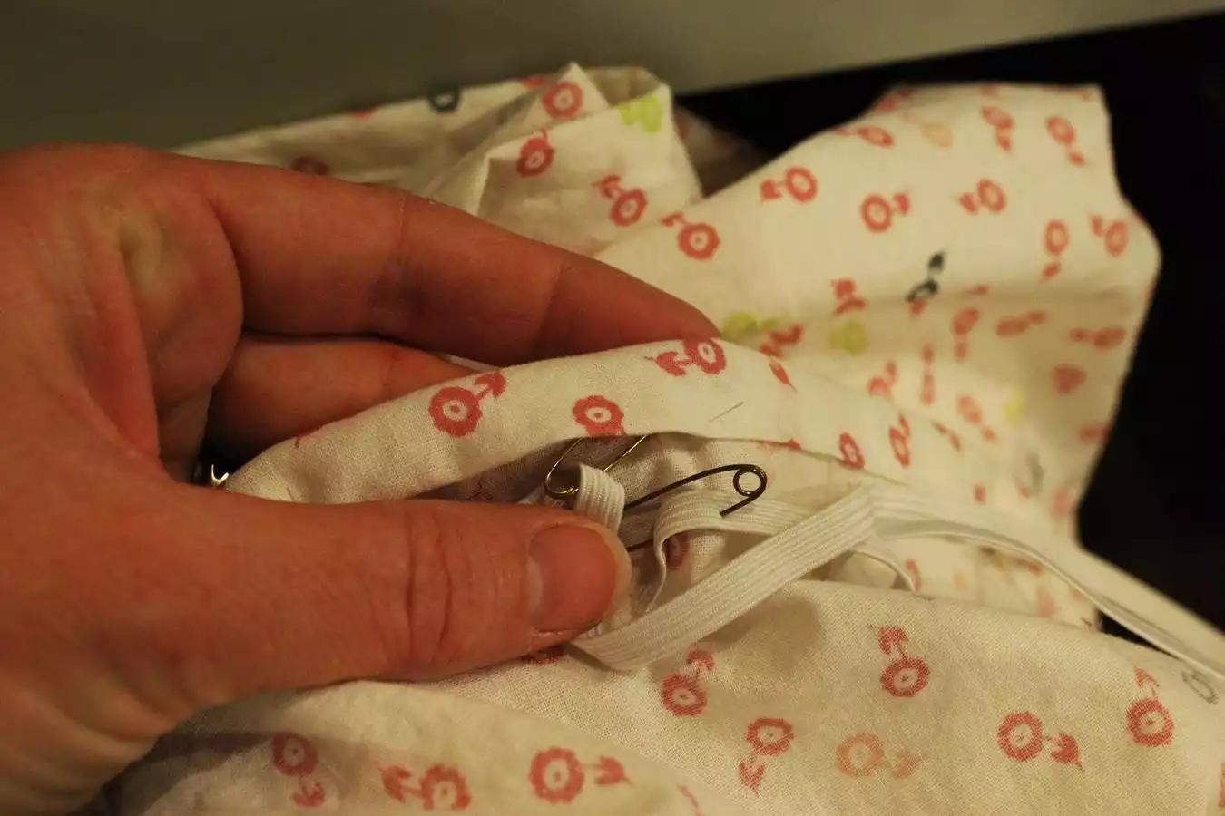 Attach a second safety pin