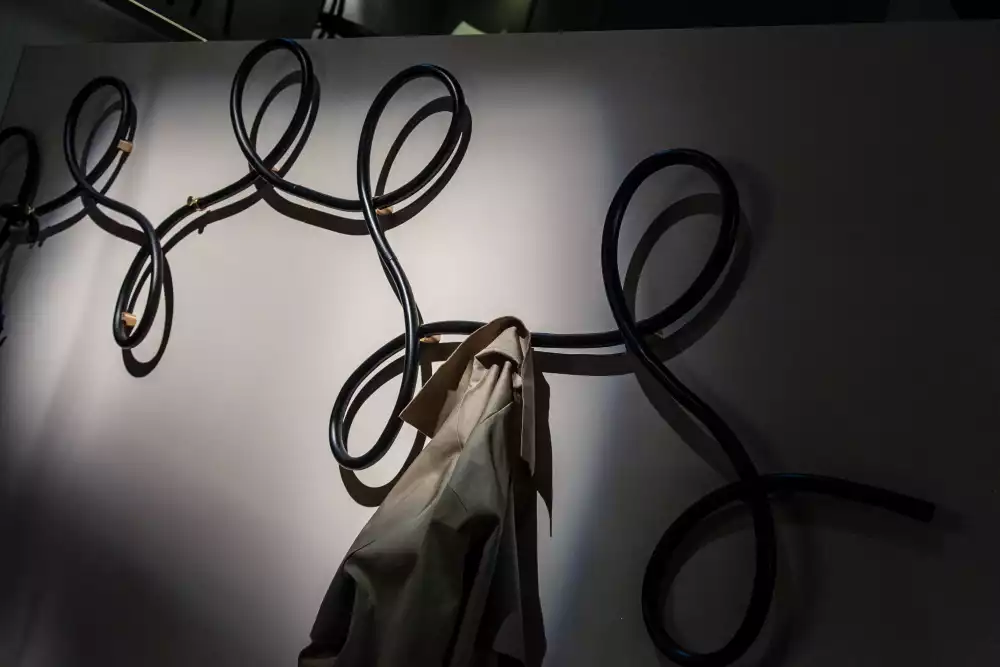 Curved coat rack for wall