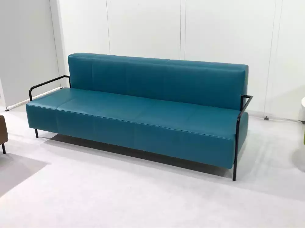 Deep aqua leather couch