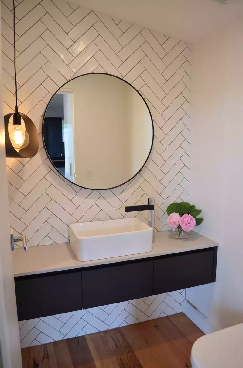 Herringbone tiles pattern for bathroom with bold grout