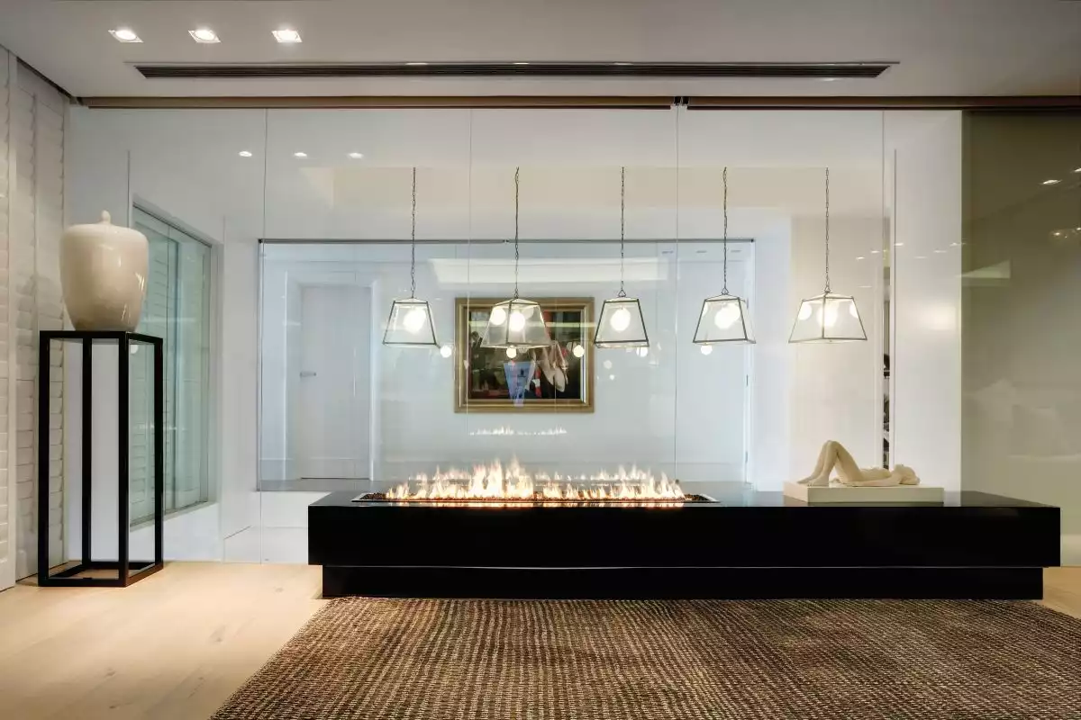 The fireplace adds a surreal, magical touch to the decor and the ambiance inside the small living area