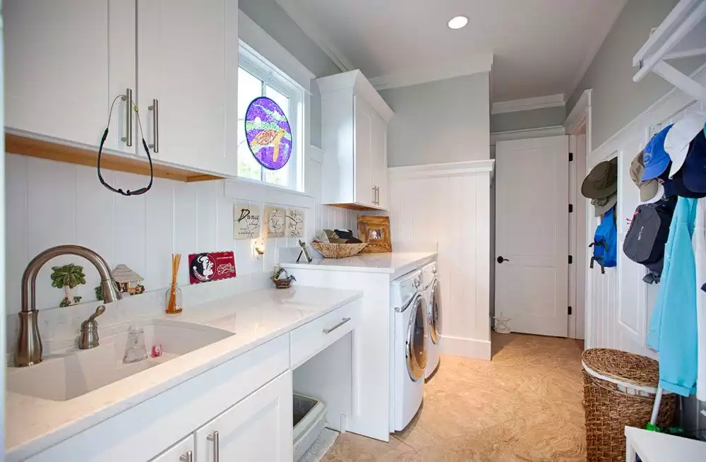 Laundry oom design with sink and storage