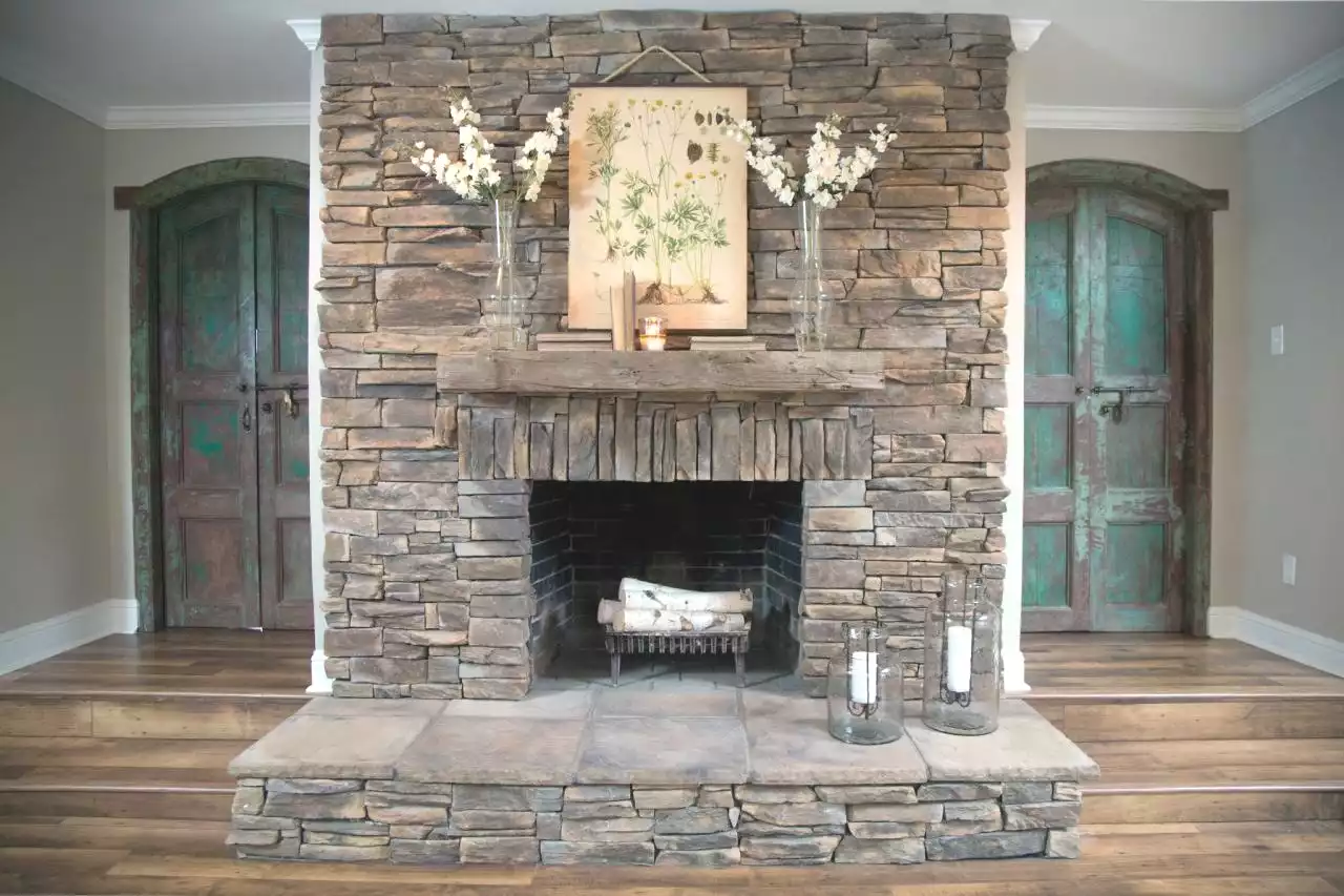decorative poster above the fireplace mantel shelf