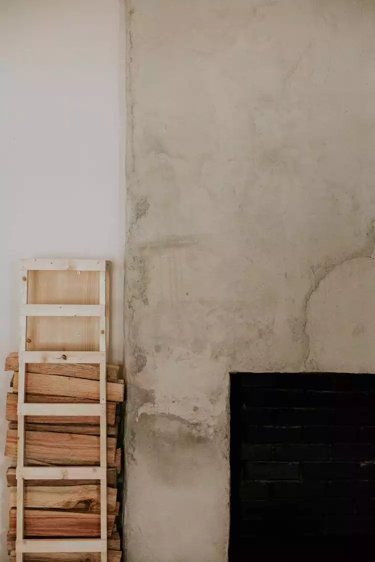Modern firewood storage leaning